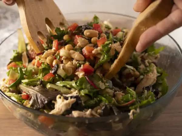 image 11580 - When it's Wednesday and you want a great salad without the restaurant baggage, Easy Mediterranean Salad will fit perfectly into your weekly menu! When you combine shredded chicken, hearty chickpeas, fiber-rich cannellini beans, crisp English cucumbers, crunchy red bell peppers, tangy Kalamata olives, earthy artichokes, and fresh mixed greens tossed with a lemon-infused olive oil dressing, you can really feel that fresh-from-the-garden joy. Easy Mediterranean Salad is a journey for the taste buds that won't leave you hungry.