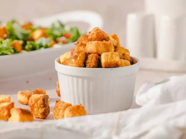 image 1168 - Leftovers sometimes get a bad rap. But with Amazing Cornbread Croutons, you will be planning ahead so that leftovers are a sure thing! When that "please don't eat all the" cornbread is cubed and tossed with two simple ingredients, olive oil and sea salt, these little morsels become pure gold for your favorite salad or side dish of choice. "No cornbread nuggets are left behind" is the theme for these savory Amazing Cornbread Croutons. They're amazing!