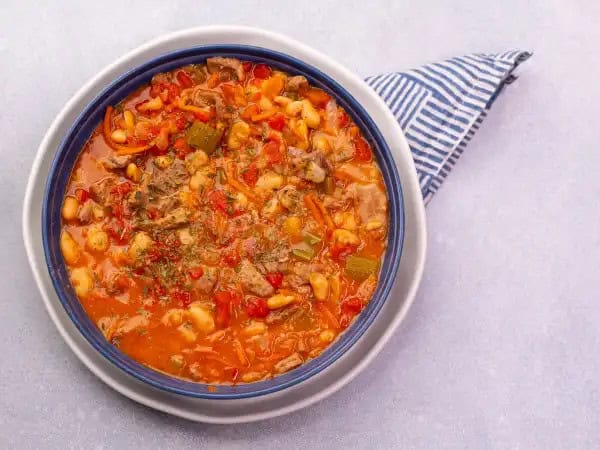 image 12762 - Nothing beats a big bowl of Wintertime Stew when the chill begins to settle in the air... except a warm fire to enjoy it with! Big chunks of savory, succulent, steak-seasoned beef help bulk up each spoonful, with plenty of creamy, protein-packed beans to add even more filling fun! Herbaceous, flavorful, and oh-so warming, Wintertime Stew casts the cold right out the door!