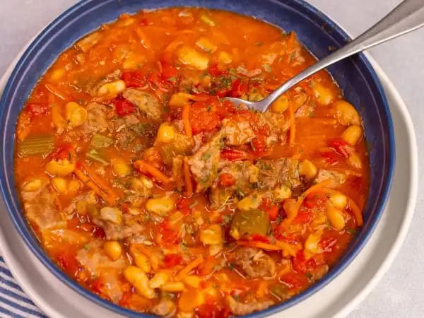 image 12767 - Nothing beats a big bowl of Wintertime Stew when the chill begins to settle in the air... except a warm fire to enjoy it with! Big chunks of savory, succulent, steak-seasoned beef help bulk up each spoonful, with plenty of creamy, protein-packed beans to add even more filling fun! Herbaceous, flavorful, and oh-so warming, Wintertime Stew casts the cold right out the door!