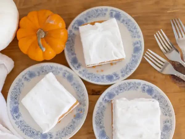 image 12951 - Lines and lines of luscious luxury! That's the beauty of the Pumpkin Dessert Lasagna! A sandwich cookie crust topped with creamy, warming, autumn-loving pumpkin pudding and a tangy cream cheese filling. The beautiful, inviting stripes of scrumptious sweetness will make you feel the magic of fall even in the depths of winter or in the heat of summer! Pumpkin Dessert Lasagna might not be lasagna in the traditional sense, but it packs a powerful flavor all the same!