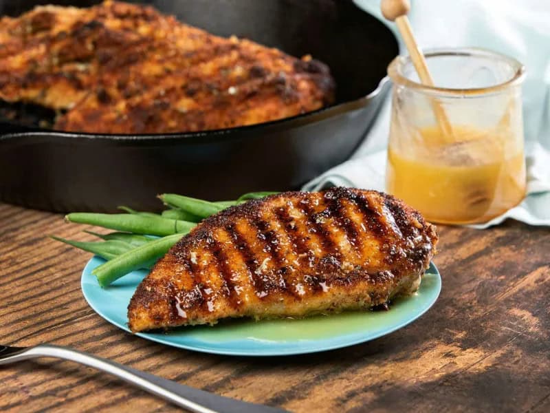 image 13132 - The name "Honey Butter Chicken" just rolls off the tongue with the same luxury and indulgence your tastebuds will experience on the first bite! In fact, the name itself reveals the magic formula to dinnertime amazement: savory chicken sautéed in butter and then slathered in even more rich butter mixed with sweet floral honey. Fragrant poultry seasoning and crunchy bread crumbs add texture and flavor to what is already an astounding taste. Honey Butter Chicken is so easy and quick, any chef of any level can make it, but it tastes like a masterpiece.