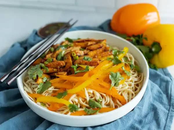 image 1425 - When the question is "what's for dinner," this dish is an answer that always makes people cheer! Sesame Chicken & Noodles are simple, speedy, and just so scrumptious! The noodles are tender and infused with the buttery and nutty flavor of sesame. Mixed in are sweet, tangy, savory chicken strips with a touch of garlic and chili heat. Mmmm, in just 20 minutes, you'll be eating Sesame Chicken & Noodles and living your best life!