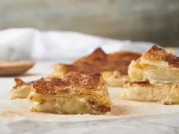 image 14270 - It's not hyperbole! It's Incredible Cream Cheese Squares! How can they not be incredible? Each one is filled with a sweet, rich, creamy, and tangy cream cheese filling, sandwiched by buttery crescent roll layers. On top is another treat: classic cinnamon-sugar! Incredible Cream Cheese Squares will have you exclaiming how wonderful they taste!