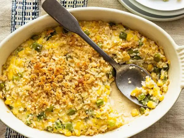 image 14345 - Surely you've heard of scalloped potatoes, but what about a more summery take on the beloved dish? Something a little sweeter, a little brighter, a little more corny? Well, a lot more corny, really. Scalloped Corn Casserole is a creamy, savory bake with a lot of flavor packed into it, with a crunchy breadcrumb topping to boot! You can't really go wrong with the Scalloped Corn Casserole: not the speed and certainly not the taste!