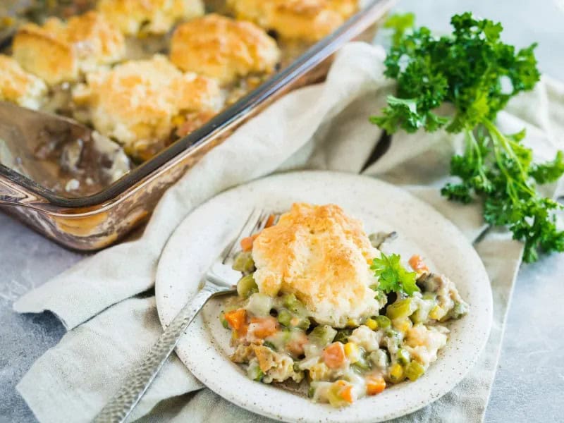 image 14508 - When the weather gets cooler (or honestly, in any climate), you need a dish that'll satisfy you in a way that will always require a nap afterward. Biscuit Pot Pie is sure to fill you to the brim and make you feel all comfy and cozy. The comfy starts with the savory, thick veggie filling that brings all the garden-fresh flavor. The cozy is present thanks to the salty, fluffy, flaky, homemade biscuits dolloped on top. Mmm, don't you feel at home just reading this? Grab your favorite fuzzy blanket and a big helping of Biscuit Pot Pie: it's time to get stuffed full of all this delicious, nostalgic goodness!