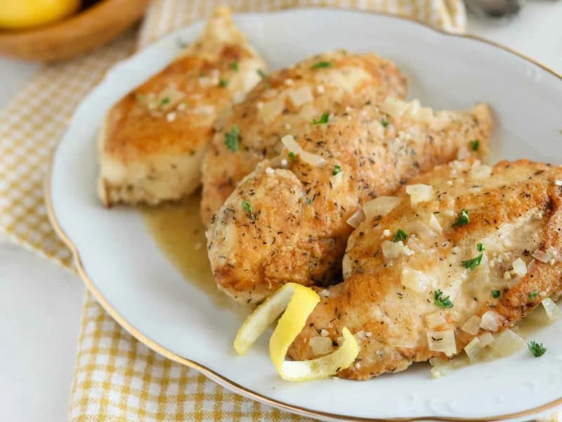 image 14616 - Close your eyes as you take your first bite and this dish will convince you you're in a sunny meadow amid spring. Country Lemon Chicken is sautéed to a deep golden color in rich margarine and saturated with bright lemon flavors. The citrus and herb sauce brings out the most of the savory chicken flavor, making this an extra meaty main course. Country Lemon Chicken lets you sit back and enjoy the midday sunshine even at night!