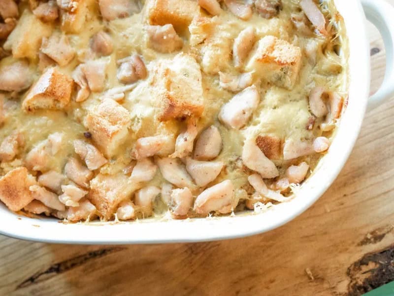 image 14617 - Cornbread Chicken Bake is an easy, flavorful, and satisfying chicken casserole that is perfect for any night of the week! If you have leftover cornbread from another meal, this recipe will put it to good use. This casserole contains tender chicken, savory cornbread, crunchy onion, rich cream of chicken soup, and more for the ultimate comfort flavors. Cornbread Chicken Bake is scrumptious and will warm you up from the inside out.