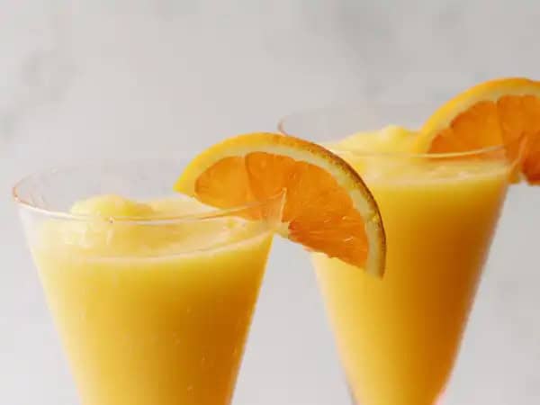 image 14863 - You're lounging around on a brightly colored float with your favorite shades on and a nice, tall, icy drink in hand without a care in the world. Ahhh, that kind of ultimate relaxation is one of the best parts of life, isn't it? That's where one swig of a Whipped Frozen Creamsicle takes you every time! This refreshing, citrusy adult slushy makes all our orange, mango, and creamy dreams into a warm weather reality. And in that reality, there is nothing to worry about and only fun to be had. Sounds pretty sweet, eh?! Let a glass of some Whipped Frozen Creamsicle whisk you away on a sweet, sweet summertime escape!