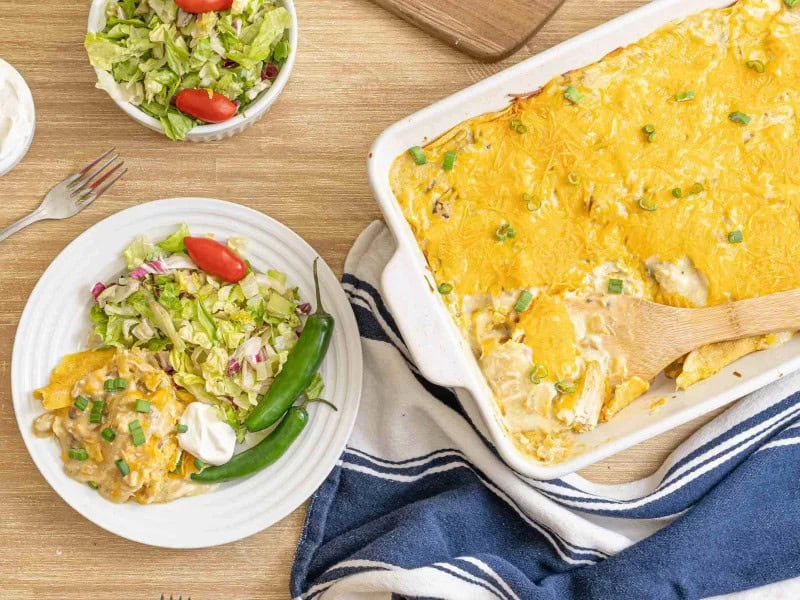 image 15050 - Step aside, tacos: Chicken Tortilla Bake is about to steal the show! Layer upon layer of classic Tex-Mex flavors come together to build towering helpings of tantalizing taste: crisp tortillas, savory chicken, spicy chiles, and sharp cheese in every bite draws you back for more. Chicken Tortilla Bake invites you to melt into its melty, creamy flavor and relax after a long day. This is an invitation you can't turn down!
