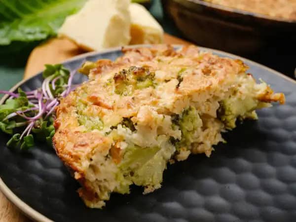 image 15460 - We tend to think of oatmeal as an exclusively sweet dish, but it's all about how you use it! This Savory Oatmeal Bake demonstrates how oatmeal can still be hearty and filling without all the sugar! Filled with garden-fresh broccoli, melty, rich cheese sauce, and even an egg for extra protein, this Savory Oatmeal Bake might just change how you look at oatmeal from now on!