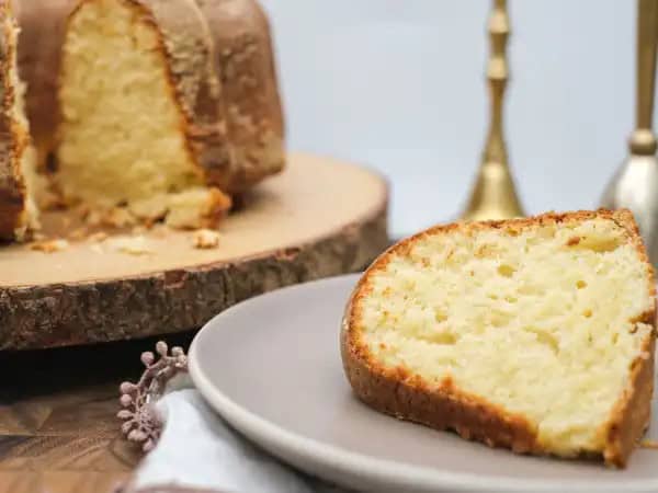 image 16148 - It's amazing that something so seemingly humble could be worth a million bucks. But trust us, once you bite into it, this cake won't seem so humble... in fact, it'll seem like a gold mine! This Million Bucks Pound Cake is literally golden, too. It's a buttery and tender treat that practically sparkles with richness. You can let your tastebuds enjoy the wealth that is the Million Bucks Pound Cake in an instant!