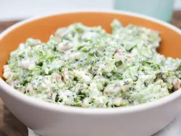 image 16180 - Is it even summer without a great picnic or two? Time to find the gingham blanket, the basket, and your favorite picnic fare! Ours includes a humble, but delicious, creamy side salad; this Broccoli Picnic Salad! This garden-fresh, crisp, and verdant dish is filled with sharp cheese and savory scallions, and of course succulent, crunchy bacon bits. A tangy mayo dressing really helps Broccoli Picnic Salad get into the picnic spirit! Enjoy the sunshine in style and with something scrumptious to eat!