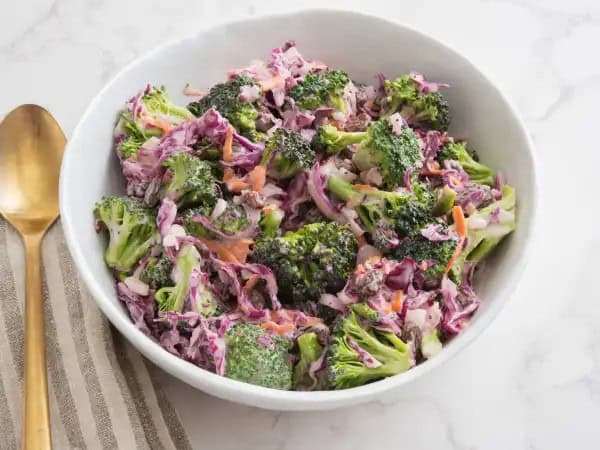 image 16205 - Your beloved, summery side dish is about to get a green and refreshing upgrade! Broccoli Slaw brings that extra crunch you didn't know you were longing for! Mixed with your favorite creamy, tangy coleslaw dressing, this Broccoli Slaw is here to cool off your summer days and make them even more delicious!