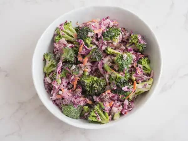 image 16206 - Your beloved, summery side dish is about to get a green and refreshing upgrade! Broccoli Slaw brings that extra crunch you didn't know you were longing for! Mixed with your favorite creamy, tangy coleslaw dressing, this Broccoli Slaw is here to cool off your summer days and make them even more delicious!