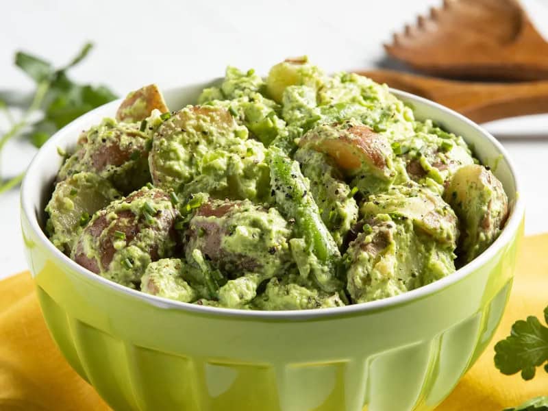 image 16291 - If your family reunion goers are tired of the same old picnic potato salad, jazz things up a bit with this old-but-new-again uniqueness. Green Goddess Potato Salad is sure to grab their palate-starved attention. The tender red potatoes and snappy peas, drenched in a kaleidoscope of creamy don't-hold-the-anchovy flavors, will have them seeing green. They will be mesmerized with the distinctness that Green Goddess Potato Salad delivers every time. All of your fellow picnic-goers and potato salad makers will be green with envy! And you know what... that will be just fine! Go green!