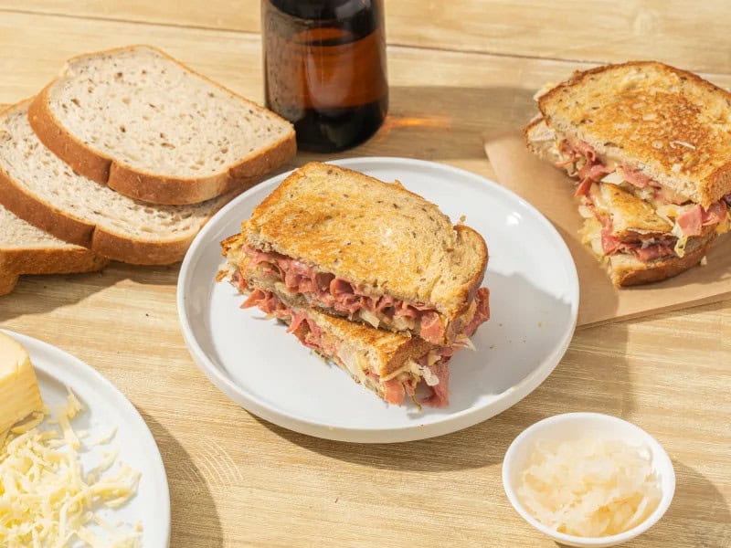 image 16477 - If you didn't think you could love your good, ole, cheesy, crispy grilled cheese more, then think again! Golden-Classic Corned Beef Grilled Cheese brings the hearty and the flavor and turns it up all the notches with tender slices of corned beef layered between melted Jarlsberg® cheese and toasted rye bread. The tangy sauerkraut adds a nice crunch and balances the richness of all the creamy, meaty, and toasty flavors melded together. Perfect for lunch or a quick dinner, this Golden-Classic Corned Beef Grilled Cheese is sure to become your newest favorite comfort food!