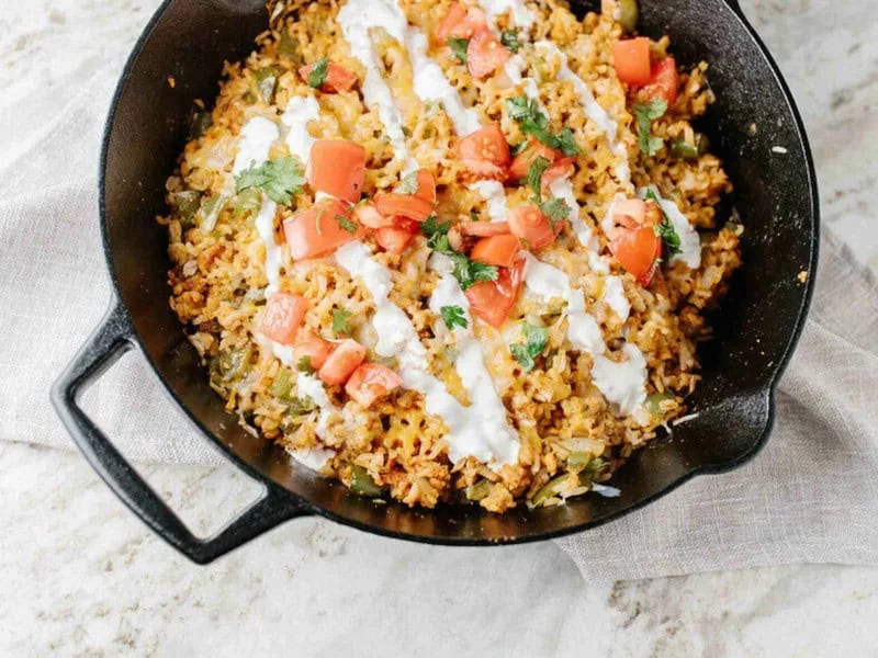 image 16955 - When the road’s been dusty and tiresome, coming home to a speedy and sensational meal is nothing short of amazing. The Southwestern Chicken Skillet combines the bright, fresh, spicy flavors of the Southwestern U.S.A. in a single pan, so you can cook it in half an hour and clean it in even less time. Loaded with savory chicken, tangy tomatoes, melty cheese, and tender vegetables, the Southwestern Chicken Skillet is a complete meal in one colorful and exciting dish. Get ready to hit the trails again after eating this!