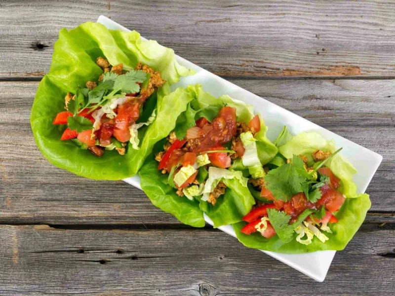 image 16974 - You'll love this Mexican-Asian fusion! All of the bold flavors of carnitas tacos wrapped up in an Asian-inspired lettuce wrap. This dish is easy to make and is better for you than traditional tacos! Top with salsa, sour cream, cheese, cilantro, or any other desired toppings.