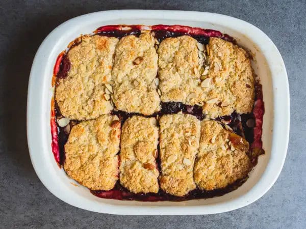 image 18181 - What happens when an apple pie, a berry pie, and a cobbler come together to make a dessert that truly defines the harvest season? The Fall Dessert Bake, of course! The filling is pure ooey-gooey jammy goodness, with tart apples and sweet berries sweetened with brown sugar and a touch of cinnamon. Meanwhile, the crust is an extra crunchy buttermilk treat, loaded up with almonds for nuttiness and an extra crisp sensation. Indulge in the Fall Dessert Bake and you'll find yourself fully immersed in that true autumn feeling!