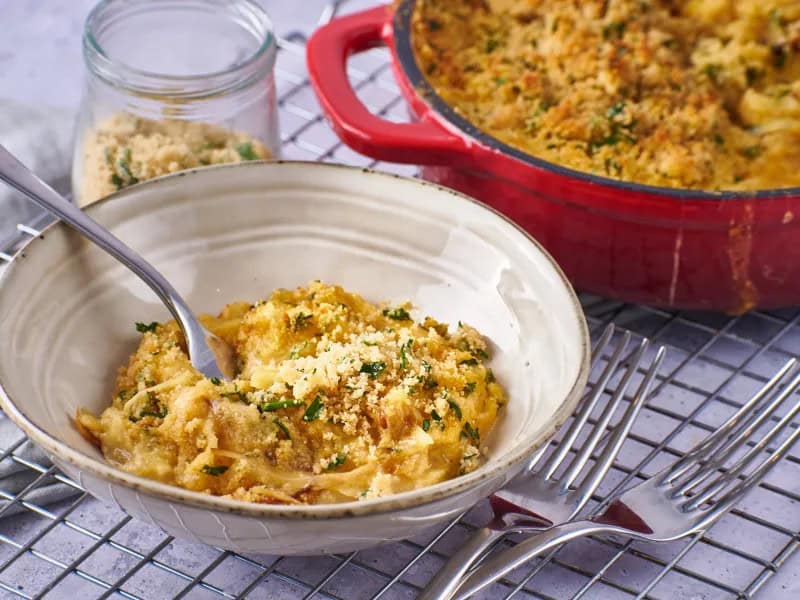 image 18351 - This dish earns the title of Best Cheesy Potato Casserole on two different levels. First, any combination of cheese and potatoes becomes the best by default; it might actually be culinary law that crunchy-on-the-outside, fluffy-on-the-inside hashbrown potatoes paired with melted cheese pushes any dish to the top. Second, this Best Cheesy Potato Casserole embodies the best of that already-outstanding combination! The sharp cheddar cheese is amplified by savory, creamy chicken flavors and tangy sour cream, with the breadcrumbs adding some extra crunch to the crunchy potatoes. It's simply the best! Your tastebuds will know it in an instant!