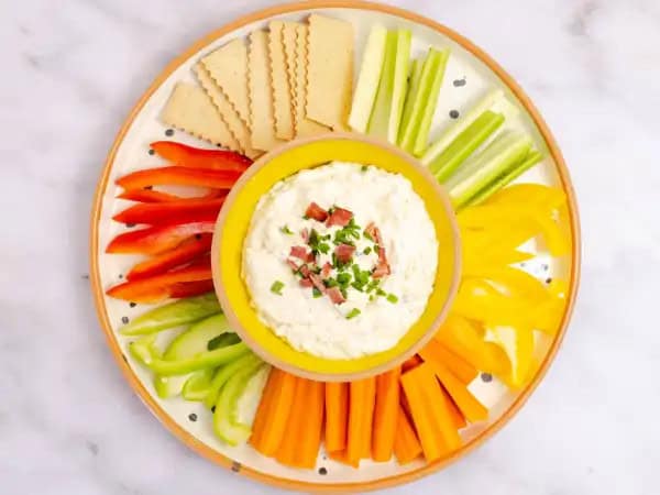 image 18818 - This is not just any ranch dip. This is Ranch Crack Dip; the epitome of ranch dips! The inclusion of succulent bacon bits certainly does elevate it, but it's more than that! It's the tanginess and the zestiness of the spices mixed in, the cheesy goodness and the sharp savory flavor of green onions. You'll be more than eager to crack into this Ranch Crack Dip!