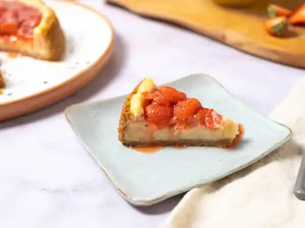 image 20714 - Your taste buds will be singing like angels for this Heavenly Strawberry Cheesecake! This slice of delight is creamy, rich, and basically melts in your mouth. It's got a crunchy, buttery crust and a blissfully sweet strawberry sauce that will make you sing. Every bite of Heavenly Strawberry Cheesecake really feels like a massive blessing! Get ready to feel the purest joy ever!