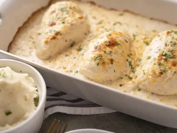 image 21115 - There's something just so enticing about this Baked Cream-of-Mushroom Chicken. Maybe it's the juicy, golden chicken. Or perhaps it is the creamy, tangy, cheesy mushroom sauce that coats every inch of the chicken and makes every bite just so delectable and delightful! You'll want plenty of egg noodles or mashed potatoes to serve with it, so you don't miss out on even a little of this delicious dish. Baked Cream-of-Mushroom Chicken makes dinner just so much more amazing!