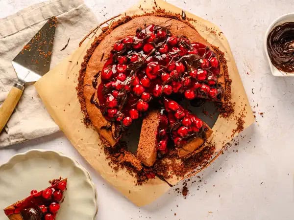 image 21479 - Black Forest Tart is proof that some flavor combinations work even outside of their original dessert. Instead of a cake, Black Forest Tart serves up a crumbly, buttery chocolate cookie crust, the perfect platform for an ethereally light and creamy chocolate filling and a bold, bright cherry topping. The tartness and fruitiness of the cherries contrast with the richness of the chocolate for a wonderful balance of flavors, which keeps you coming back for more. You'll never miss the flavor-forest-for-the-trees with this treat!