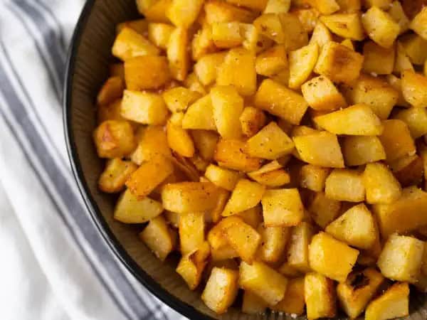 image 21551 - Potatoes are truly one of the earth's greatest gifts to us. No matter how or when you eat them, they're easily the best, most reliable part of your meal. So, whenever you get the craving for something "spud-tactular," go ahead and add Roasted Yukon Potatoes to your list of things to make. These tender, golden spuds are loaded with all sorts of flavors that make them perfect for breakfast, lunch, or dinner. Plus, they're extremely low maintenance, which makes you much more likely to act on your craving, no matter what time it is! Get ready for the best part of your meal thanks to these amazingly tasty Roasted Yukon Potatoes!