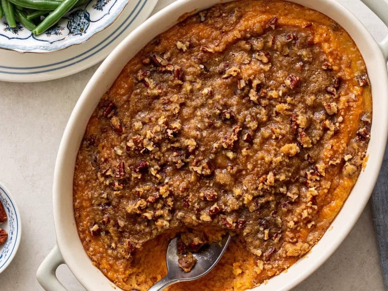 image 21729 - It's funny how we are programmed to fall into the routine of only making specific dishes during a certain time of year, season, or holiday. Well, let's all change our way of thinking and spring forward to the any-weather, flavor-perfection of this Year-Round Sweet Potato Bake. This delightful concoction of tender and smooth sweet potatoes, sweetened with just the right touches of rich vanilla and brown sugared pecans, is a time-travel trip for your taste buds, no matter the season. So, get out of the box and try this Year-Round Sweet Potato Bake any time you need a little summer sunshine in your life. Don't winter another meal without it... any time is a good time for sweet potatoes!