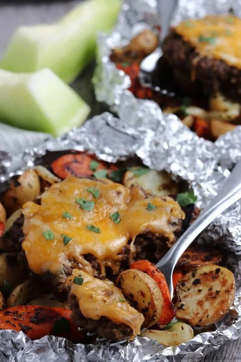 image 23 - Arrange a flawless camping dinner utilizing these scrumptious and simple camping dinner suggestions! Embrace a range of options, including traditional campfire dishes, one-pot meals, and foil packet dinners, ensuring a comprehensive selection. Explore Dutch oven camping recipes, grilled camping dinners, campfire kabobs, and campfire tacos, alongside campfire chili and pasta camping dinners, all designed to satisfy.