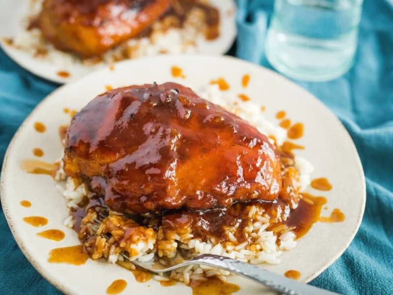 image 2698 - Candied Chicken has the perfect balance of savory and sweet, with a caramelized top that makes everyone giddy! Candied Chicken's syrupy glaze is thick and luscious, a lip-smackingly good combination; it has notes of garlic, mustard, brown sugar, tomato, and Worcestershire sauce, all of which pair beautifully with the tender chicken. Serve this over rice so you don't miss a morsel!