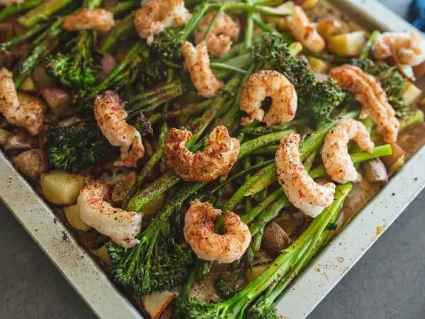 image 3092 - When we say Easy Shrimp Bake is easy, we aren't kidding around. All it asks of you is to stack tender, savory, and pink shrimp atop refreshing and tender-crisp asparagus, Broccolini®, and fluffy red potatoes. Bake and grab a plate, because Easy Shrimp Bake is ready to impress you right from the word go! It's a full seafood dinner in a single baking pan, so it feels indulgent and homey all at once. Let dinner be your excuse to take it easy this evening, right when you start cooking.