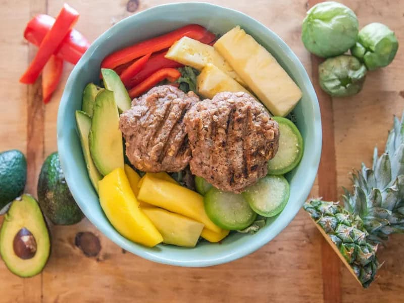 image 3620 - California Burger Bowls have ambitions. They want to amaze your tastebuds while also offering a healthy, easy, and speedy lunch or dinner. And they succeed! In less than half an hour, California Burger Bowls whip up juicy, savory turkey burgers loaded with the easygoing heat of the West Coast sun and topped with tangy and sweet bites of tropical fruit with the smooth creaminess of avocado. Each bowl is pure happiness all the way down; it leaves you feeling good and your taste buds feeling elated.