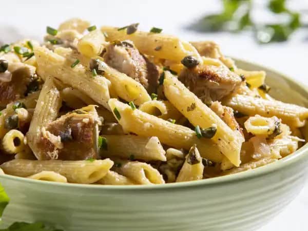 image 3822 - Chicken Piccata Pasta is an outright classic; the rich white wine, butter, and caper sauce with golden-brown and savory chicken, all mixed with tender pasta. And that pasta is the perfect shape for soaking up all the bright, zesty lemon and poultry flavor. It's a simple meal, easy to put together, and fast, making it a delight on all fronts. The Chicken Piccata Pasta is just a classically delicious dish!