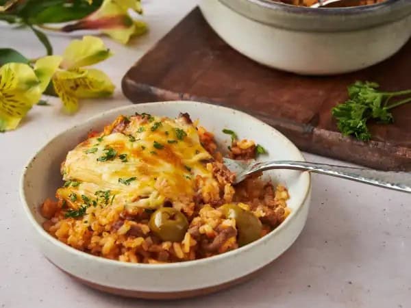 image 384 - Traveling across the beautiful plains of the Midwest, heading to the great heights of the Rocky Mountains, traveling west carries with it a lot of romance. Let your taste buds get swept away in the feeling with this Western Casserole! Packed with ground beef and Southwestern flavors, the Western Casserole is a truly majestic dish from sea to shining sea. Melty cheese, tangy olives, and wonderfully spicy chili powder ensures there's no bland or boring bites anywhere to be found in here. So, start heading west!