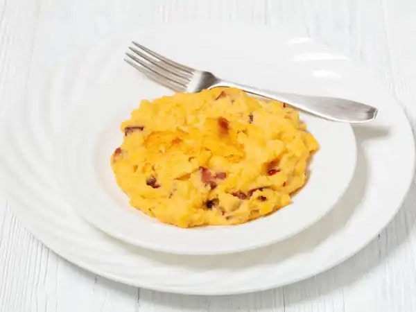 image 4203 - You can go savory or sweet with Southern grits. Southern Grit Casserole goes savory so it can be the main show-stopper, and wow, it goes all in. The tender grits provide the perfect platform for succulent, spicy sausage and melty cheese. A touch of peppery thyme sweetness ties the Southern Grit Casserole all together. You can just taste that classic hospitality in each bite!