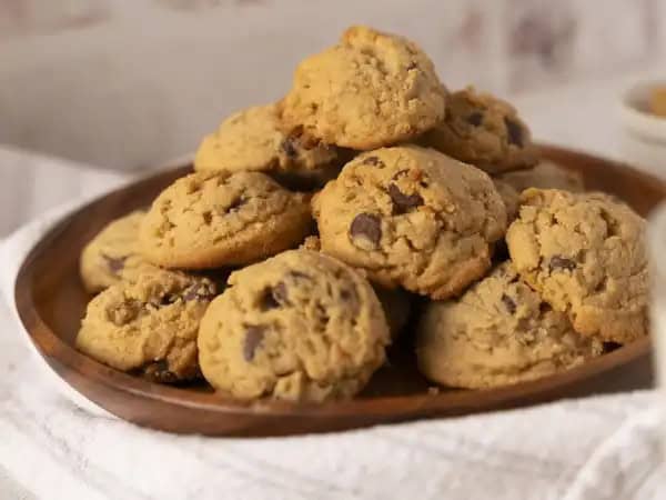 image 4238 - What's the only thing that makes a peanut butter dessert better? Yep, more peanut butter! Peanut Butter Chip Cookies go all in on that smooth, nutty goodness by baking up rich, tender, and golden-brown peanut butter cookies and then loading them with peanut butter chips! Of course, a few chocolate chips mixed in make everything even better, too! Peanut butter lovers, Peanut Butter Chip Cookies are just the cookie you've been looking for and dreaming of!