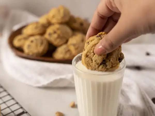 image 4246 - What's the only thing that makes a peanut butter dessert better? Yep, more peanut butter! Peanut Butter Chip Cookies go all in on that smooth, nutty goodness by baking up rich, tender, and golden-brown peanut butter cookies and then loading them with peanut butter chips! Of course, a few chocolate chips mixed in make everything even better, too! Peanut butter lovers, Peanut Butter Chip Cookies are just the cookie you've been looking for and dreaming of!