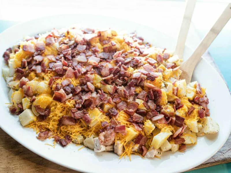 image 5012 - It’s not clear who first realized the combination of chicken, creamy and tangy ranch sauce, and fatty bacon made for a delicious partnership, but that person should be thanked a thousand times over. Sheet-Pan Chicken Bacon Ranch demonstrates exactly why with flavorful, tender, and savory chicken coated in ranch and bacon bits. With cheddar cheese for sharpness, Sheet-Pan Chicken Bacon Ranch tastes like a guilty pleasure dinner that’s still hearty and comforting.