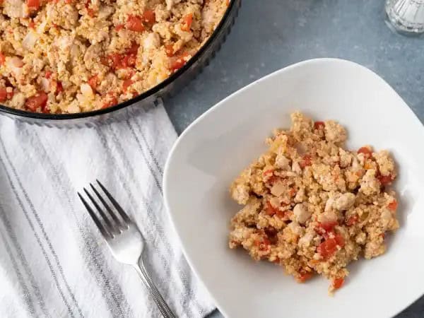 image 5240 - Let's add something a little healthy to your diet! Don't worry... it's still going to taste great! While you're out there crushing your goals and feeling good, this Whole Grain Chicken will be waiting, ready to fill you up! Grab a big bowl and fill it with this fluffy quinoa mixed with savory ground chicken, juicy tomatoes with green chile peppers, and tangy onions! You get your protein and your healthy carbs! Whole Grain Chicken helps you bring the good kind of balance into your life that you've been craving. So, go ahead and enjoy! You've worked hard for it!