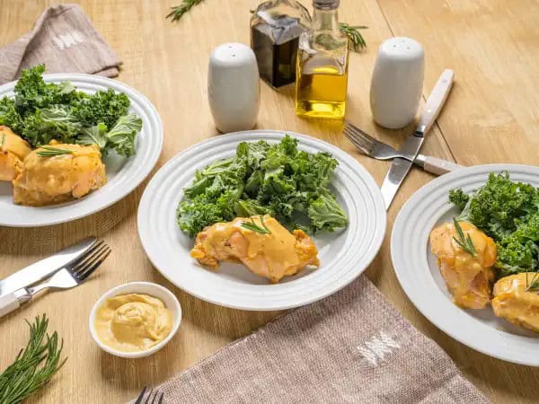 image 5770 - Holy-Yum-Yum Chicken is heaven-sent, oven-baked chicken. It's as simple as the name suggests. The chicken is braised in a tangy, sweet, and simple sauce with notes of smoky maple and mustard, until it's tender, savory, and just pure joy to eat. Then it's drizzled with a sauce created from the cooking liquids, ensuring the flavor is bold, comforting, and beautiful. That's all there is to it. Holy-Yum-Yum Chicken shows us that something can be both divinely good and a simple dinnertime delight at the same time!