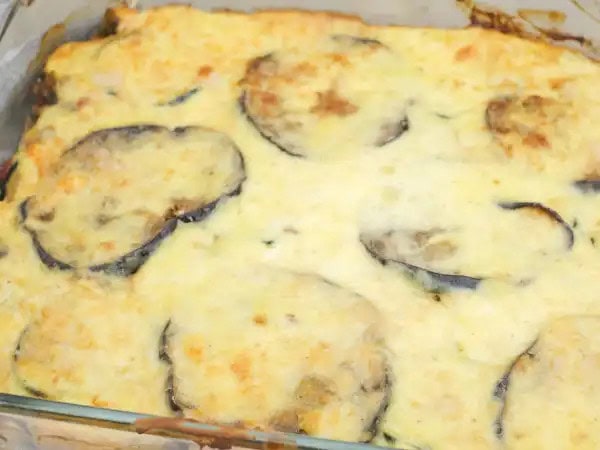 image 6572 - The Vegetarian Moussaka Bake draws from a rich heritage. Although the most famous version in America is Greek, similar dishes can be found in the Balkans and the Middle East in various forms. And good thing too, because this Vegetarian Moussaka Bake is so delicious that everyone should get to try it! The eggplant is tender and sweet, the potatoes are fluffy, the saucy is bubbly and creamy, and there's plenty of savory, aromatic, garden-fresh flavor to go around! It does require a bit of time, but the reward is so worth it!