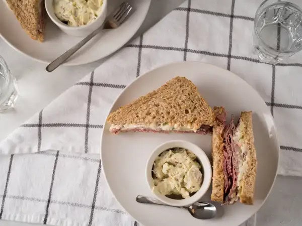 image 7646 - Craving that big taste that you can't get just anywhere? Bring the taste of an authentic New York deli into your own home with this Brooklyn Avenue Sandwich. A couple slices of tasty, nutty, and earthy rye bread, slathered with sweet and savory Russian dressing, stacked with hearty, robust pastrami, and creamy, crunchy coleslaw and you have a literal masterpiece right in the palm of your hand! Nothing takes you back to the Northeast like the tantalizing taste-trip of Brooklyn Avenue Sandwich. Take a bite out of the big apple with a bite of the best pastrami sandwich you will ever make in your own home! Now, that's what I'm talking about!