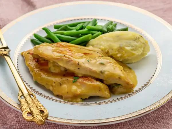 image 7808 - Pack your bags! You're about to leave the stale dinner station and start off to a new, delicious destination. That's right, you're jumping on the gravy train and heading straight to this Simple Chicken & Gravy! Choo-choo! Loaded up with all that classic old-fashioned goodness — fried, juicy chicken breasts in an amazing wine-and-dine-infused gravy mixture — it's a once-in-a-lifetime taste every time! All aboard for Simple Chicken & Gravy!
