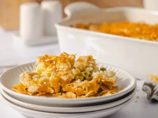 image 8038 - When you need a mental break from your workday, let's use that time to plan what's for dinner! Looking forward to this Daydream Casserole will be a great way to help pass the grueling day away. If a creamy, dreamy sauce that involves rice, chicken, water chestnuts, peas, and celery floating together, and then is topped with crushed potato chips and baked until bubbly was what you were dreaming of, it looks like there is a good chance your day has been well-spent. Awaken your dinner with Daydream Casserole and imagine the possibilities. It's so dreamy and delicious!