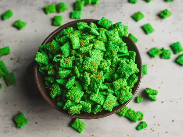 image 817 - If you need something that'll bring all the festive vibes, you're in luck! St. Paddy's Chow is coated in that vibrant shade of green that's responsible for good fortune! You'll be walking into the party pinch-free and covered in compliments because these icing-coated cereal treats taste just as fun as they look. You'll hit the jackpot with St. Paddy's Chow, no golden coins needed!