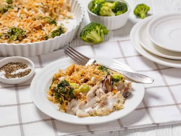 image 8608 - This Gourmet Chicken Bake knows to keep its pinky up and to bring only the best flavors to the plate! Nutty brown rice, refreshing broccoli, smoky Fontina cheese, and beefy mushrooms all join together to dress up the juicy, shredded chicken even more! Top it with some crunchy breadcrumbs and watch the elegant magic happen! Gourmet Chicken Bake brings an upper-class touch to the humble casserole!
