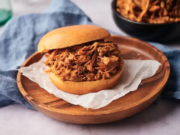 image 8674 - Southern Yank Pork seeks a middle ground between Northern and Southern cuisine using pulled pork as the bridge. Honestly, it's a pretty delicious bridge! Slow-cooked in barbeque sauce with notes of smoky sweetness and heat, the savory pork is tender and infused with tons of flavor. Each scoop of Southern Yank Pork is ready for piling high on rolls, served with salad, or just eaten with a fork!